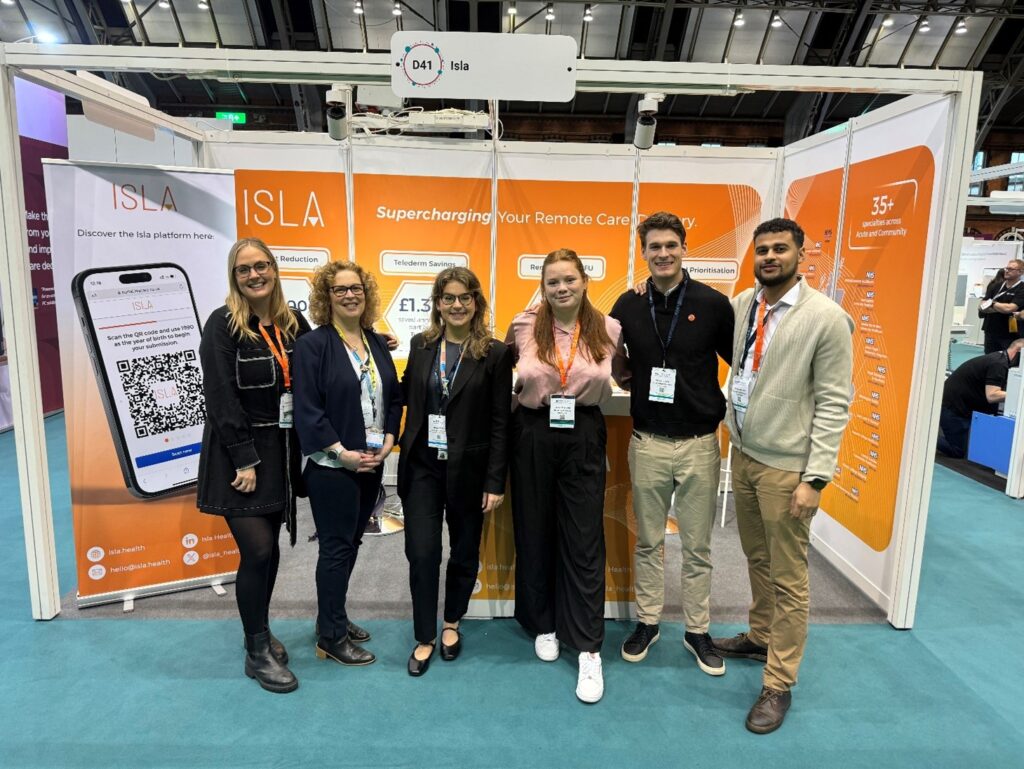 a photo showing a group of people at an exhibition